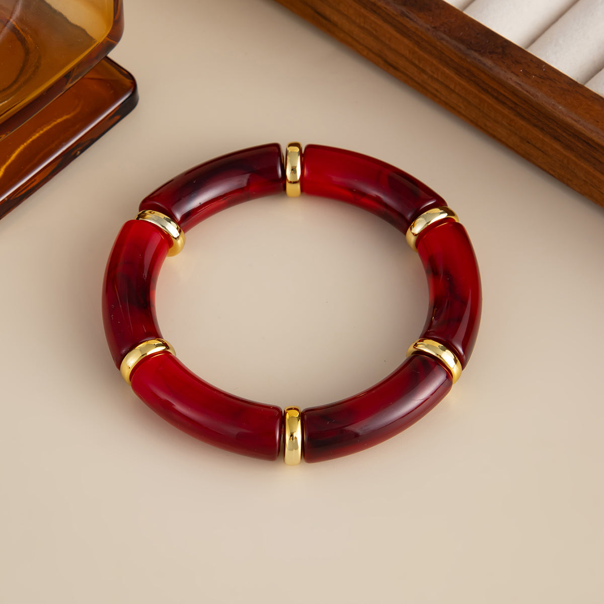 Wine Red Resin and Goldtone Sequin Joint Stretch Bracelet, vintage-inspired design, detail close-up