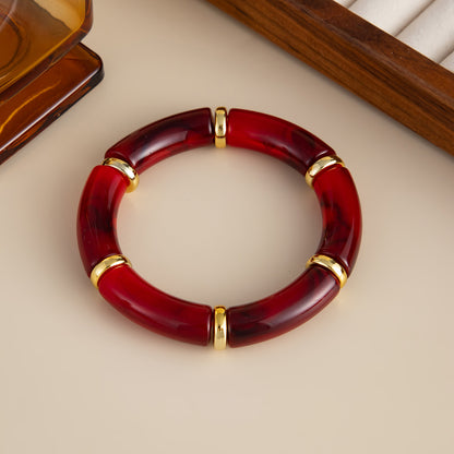 Wine Red Resin and Goldtone Sequin Joint Stretch Bracelet, vintage-inspired design, detail close-up