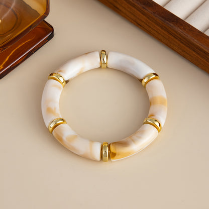 Beige Resin and Goldtone Sequin Joint Stretch Bracelet, vintage-inspired design, detail close-up