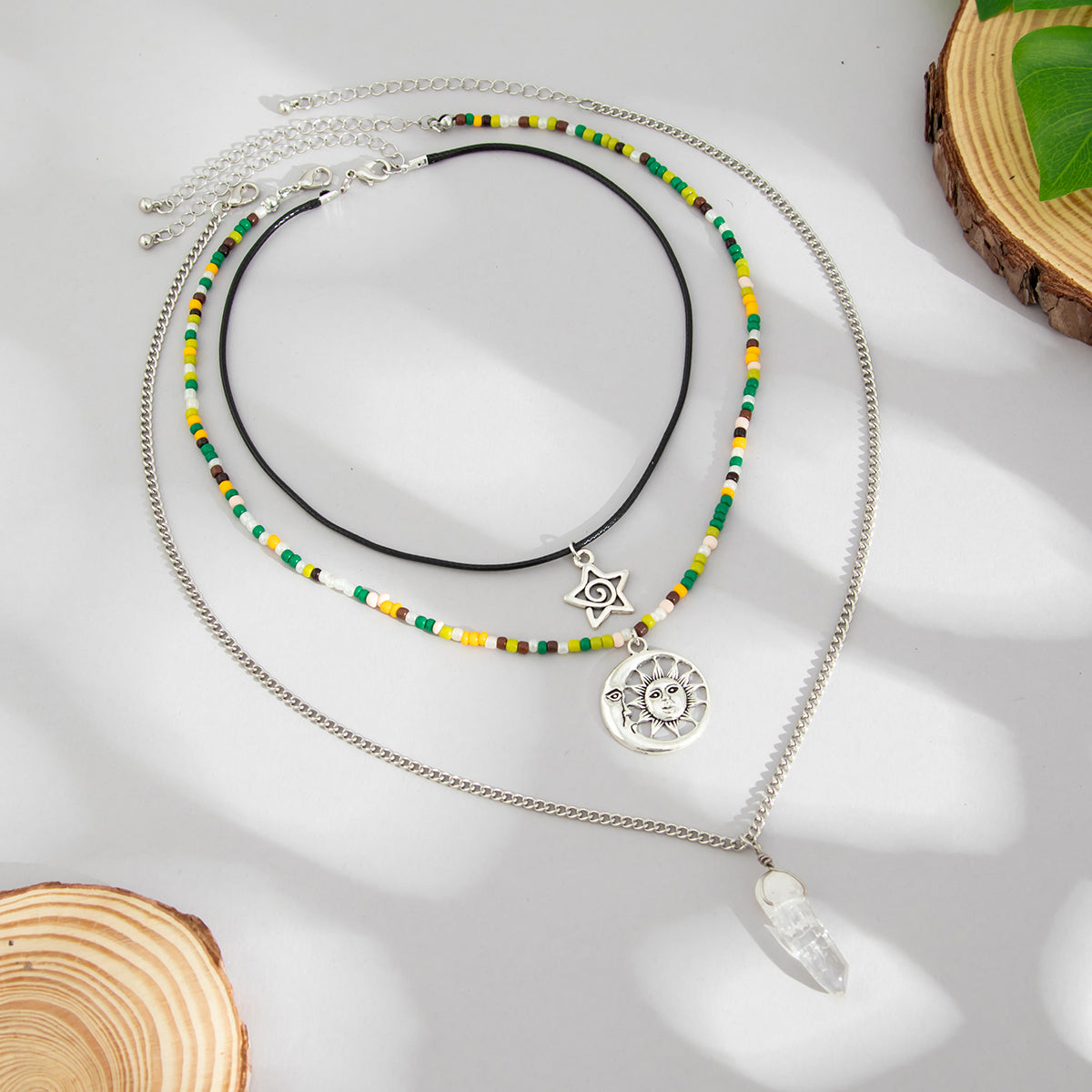 Crystal and Howlite Polyster Silvertone Sun Hexagonal Prism Pendant Necklace Set, silver pendant..., detail close-up