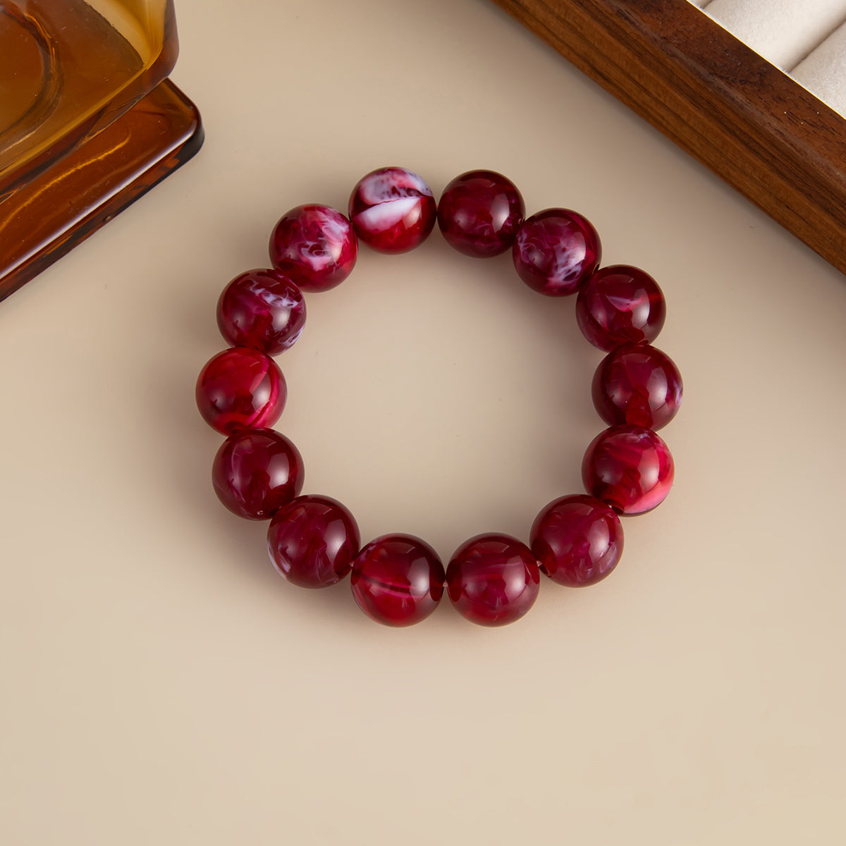 Wine Red Resin Beaded Stretch Bracelet, botanical inspired, lifestyle look