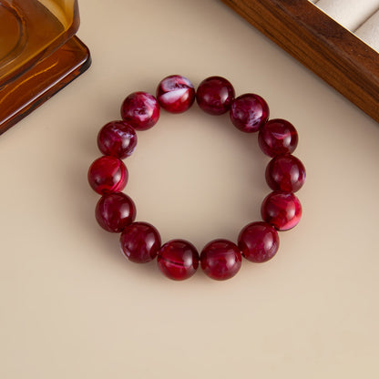 Wine Red Resin Beaded Stretch Bracelet, botanical inspired, lifestyle look