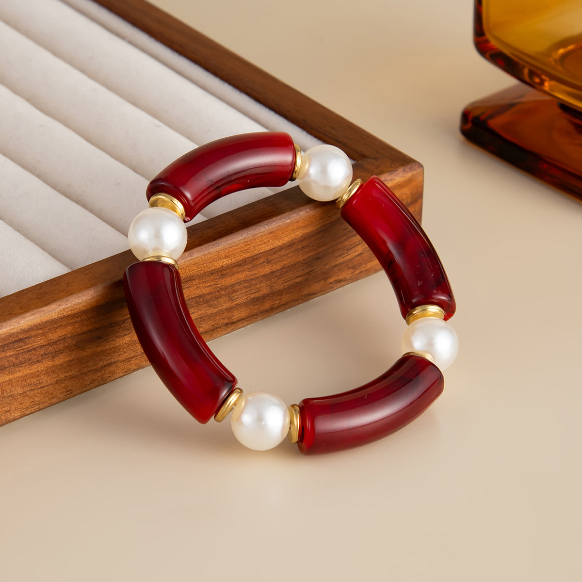 Wine Red Resin and Pearl Goldtone Sequin Joint Stretch Bracelet, dainty minimalist design, detail close-up