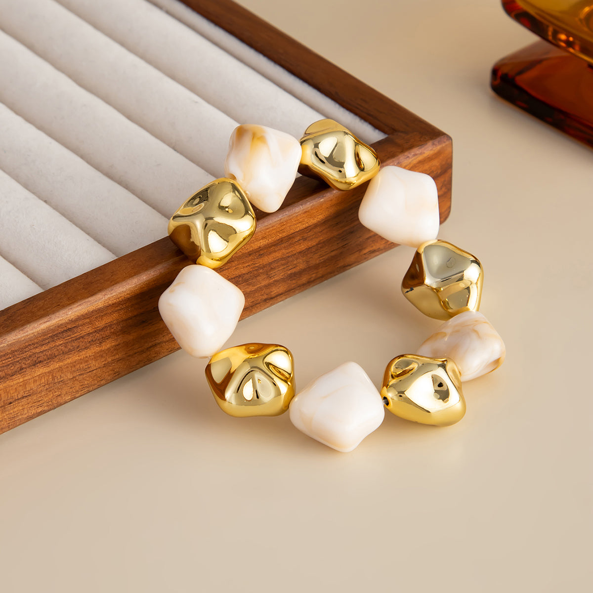 Beige Resin and Goldtone Irregular Beads Station Stretch Bracelet, dainty minimalist design, side view