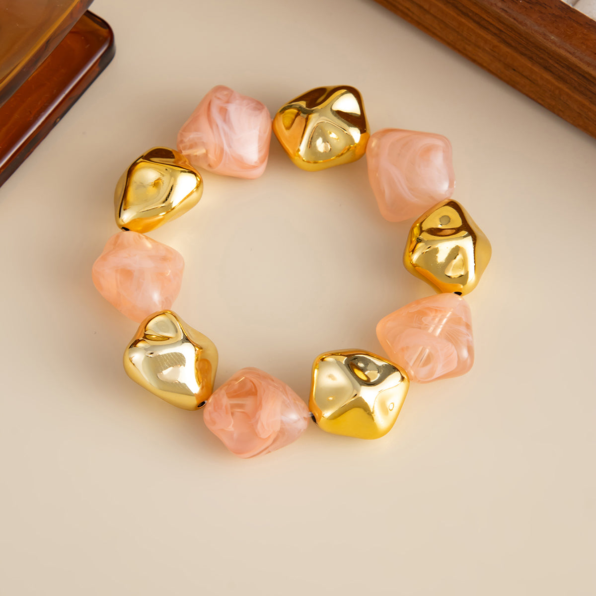 Pink Resin and Goldtone Irregular Beads Station Stretch Bracelet, everyday style, detail close-up