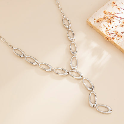 Silvertone Open Oval Drop Necklace, dainty minimalist design, side view