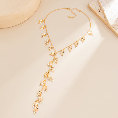 Goldtone Hammered Leaves Drop Necklace, botanical inspired, side view