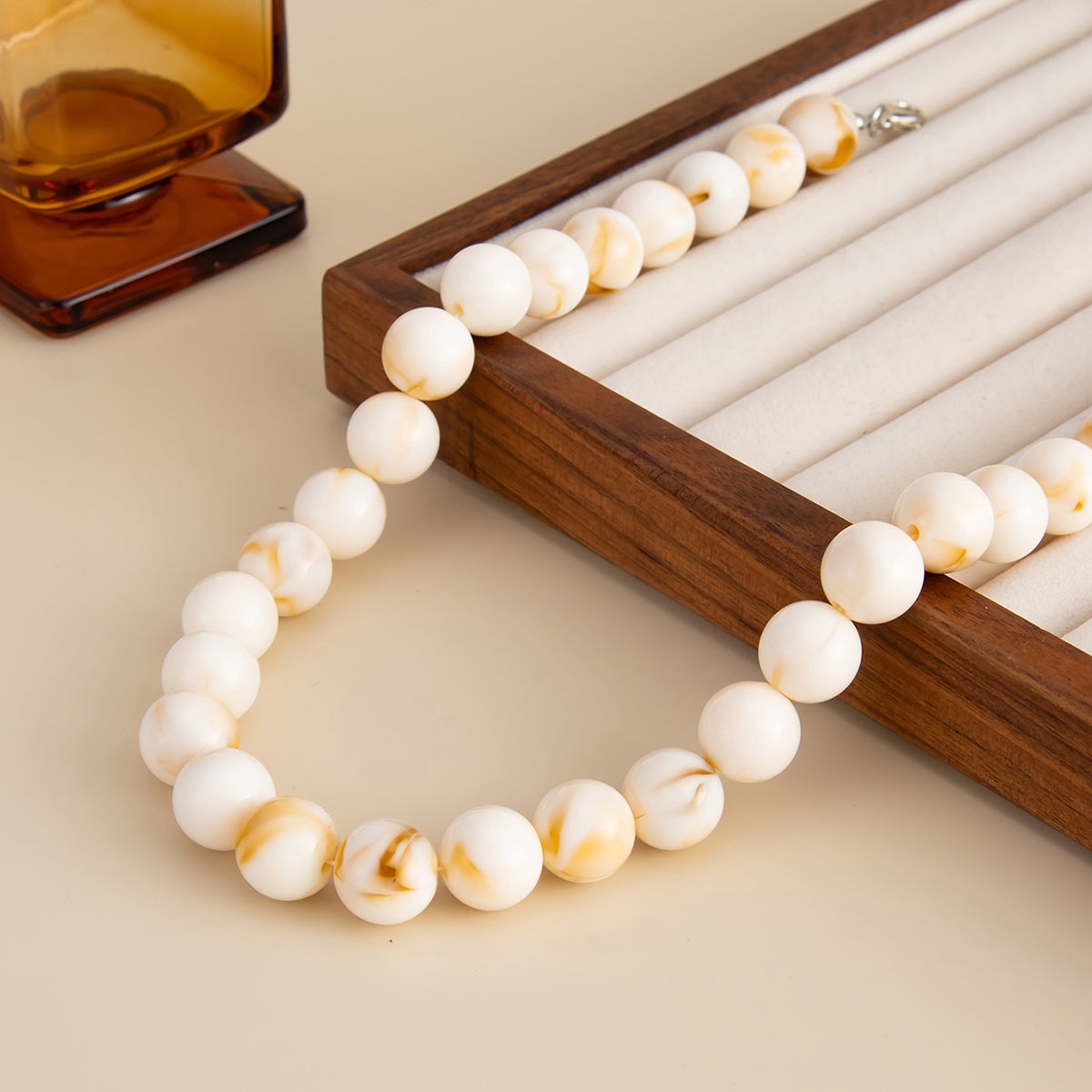 Beige Resin and Silvertone Beaded Collar Necklace, botanical inspired, side view
