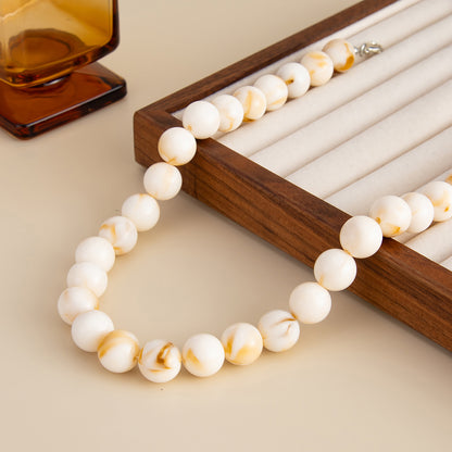 Beige Resin and Silvertone Beaded Collar Necklace, botanical inspired, side view