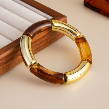 Amber Resin and Goldtone Joint Stretch Bracelet, dainty minimalist design, side view