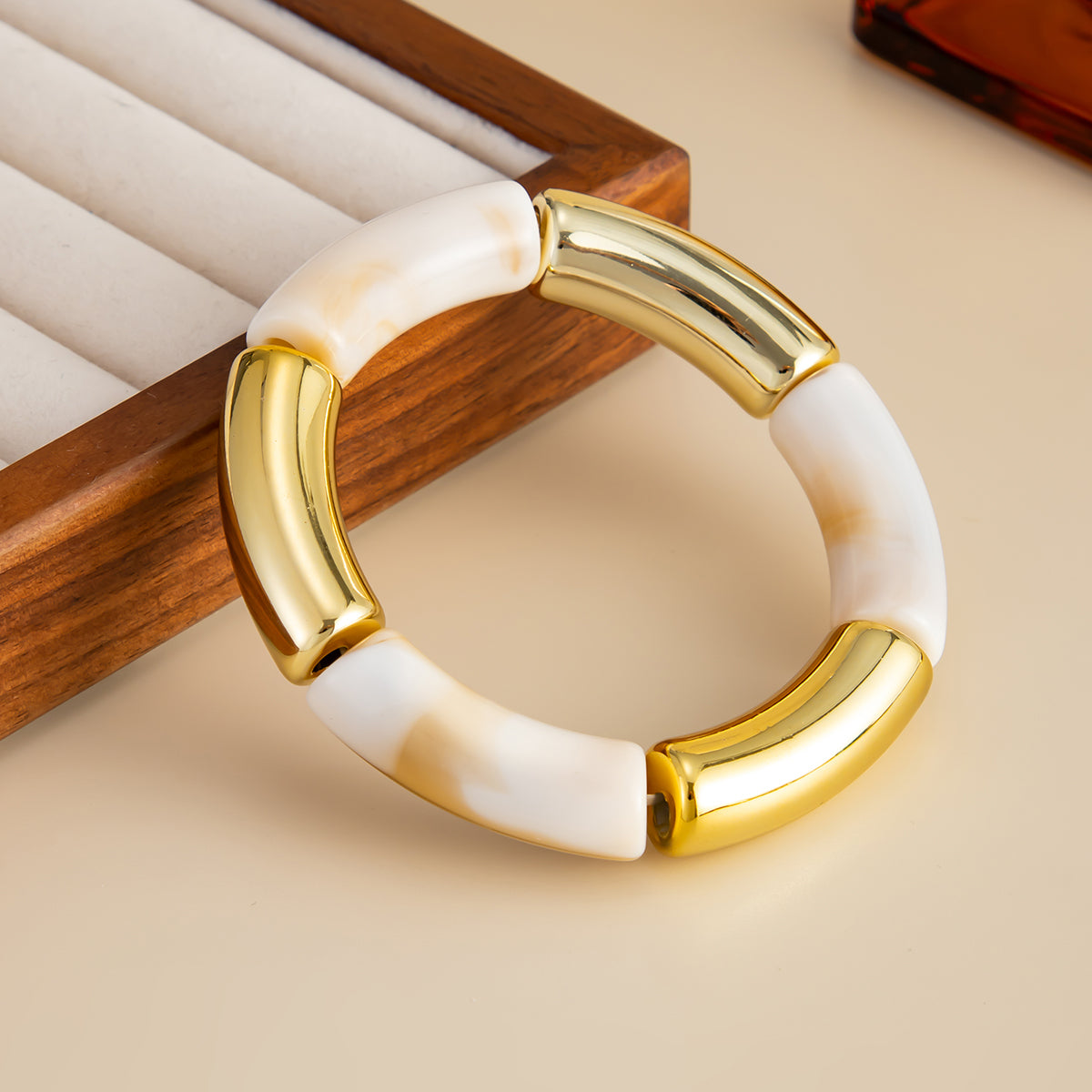 Beige Resin and Goldtone Joint Stretch Bracelet, vintage-inspired design, side view