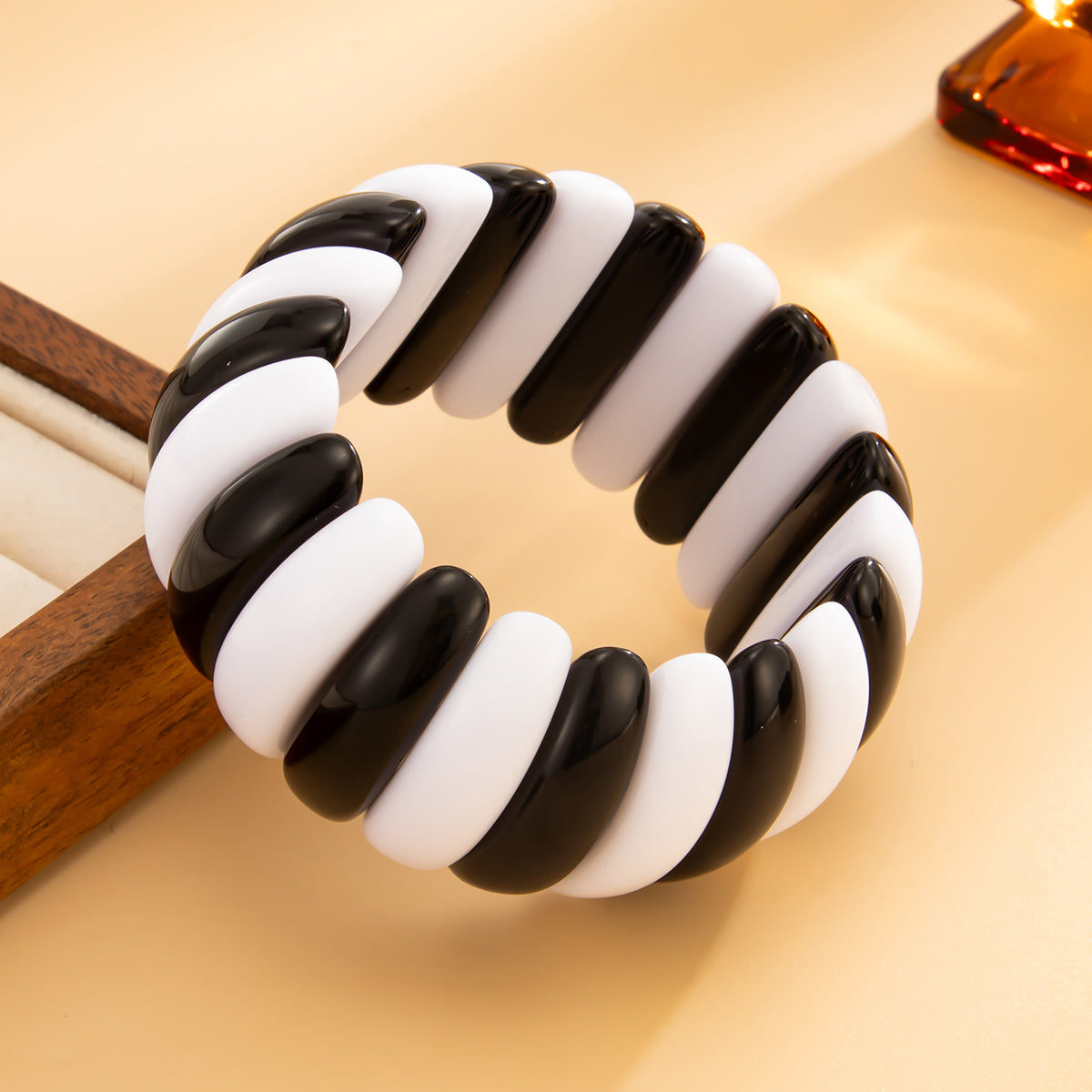 Black and White Resin Tire Stretch Bracelet, botanical inspired, side view