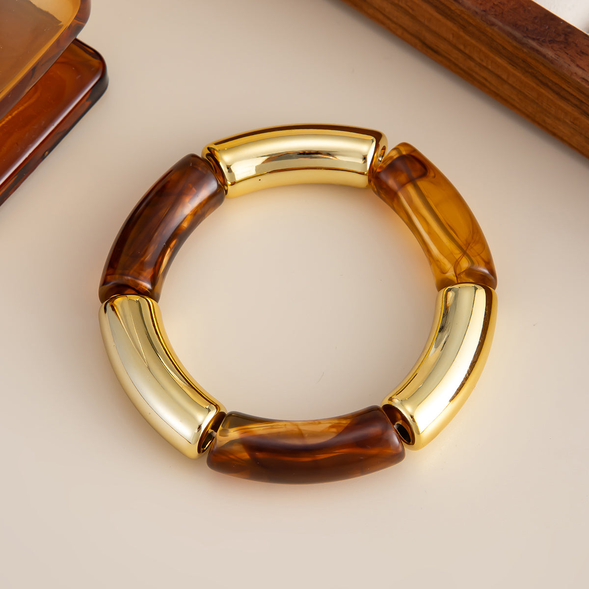Amber Resin and Goldtone Joint Stretch Bracelet, dainty minimalist design, detail close-up