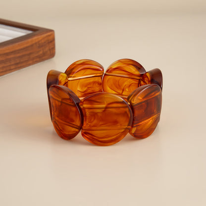 Dark Coffee Resin Notched Circular Stretch Bracelet, dainty minimalist design, side view