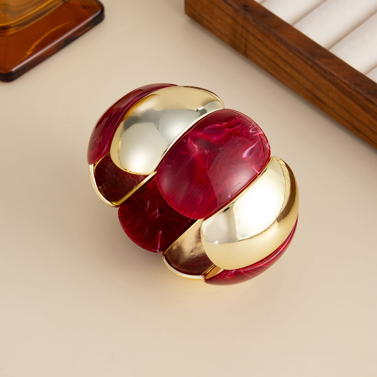 Dark Red Resin and Goldtone Petals Stretch Bracelet, dainty minimalist design, side view