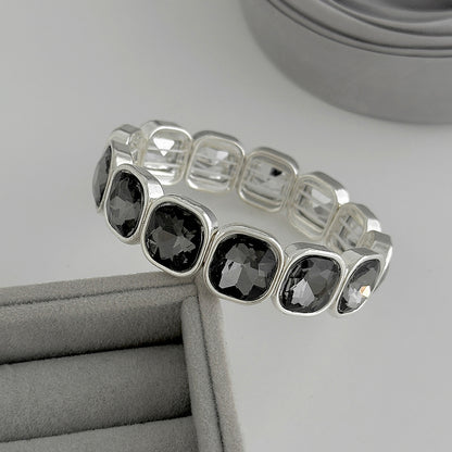 Crystal and Silvertone Square Station Tennis Bracelet, botanical inspired, detail close-up
