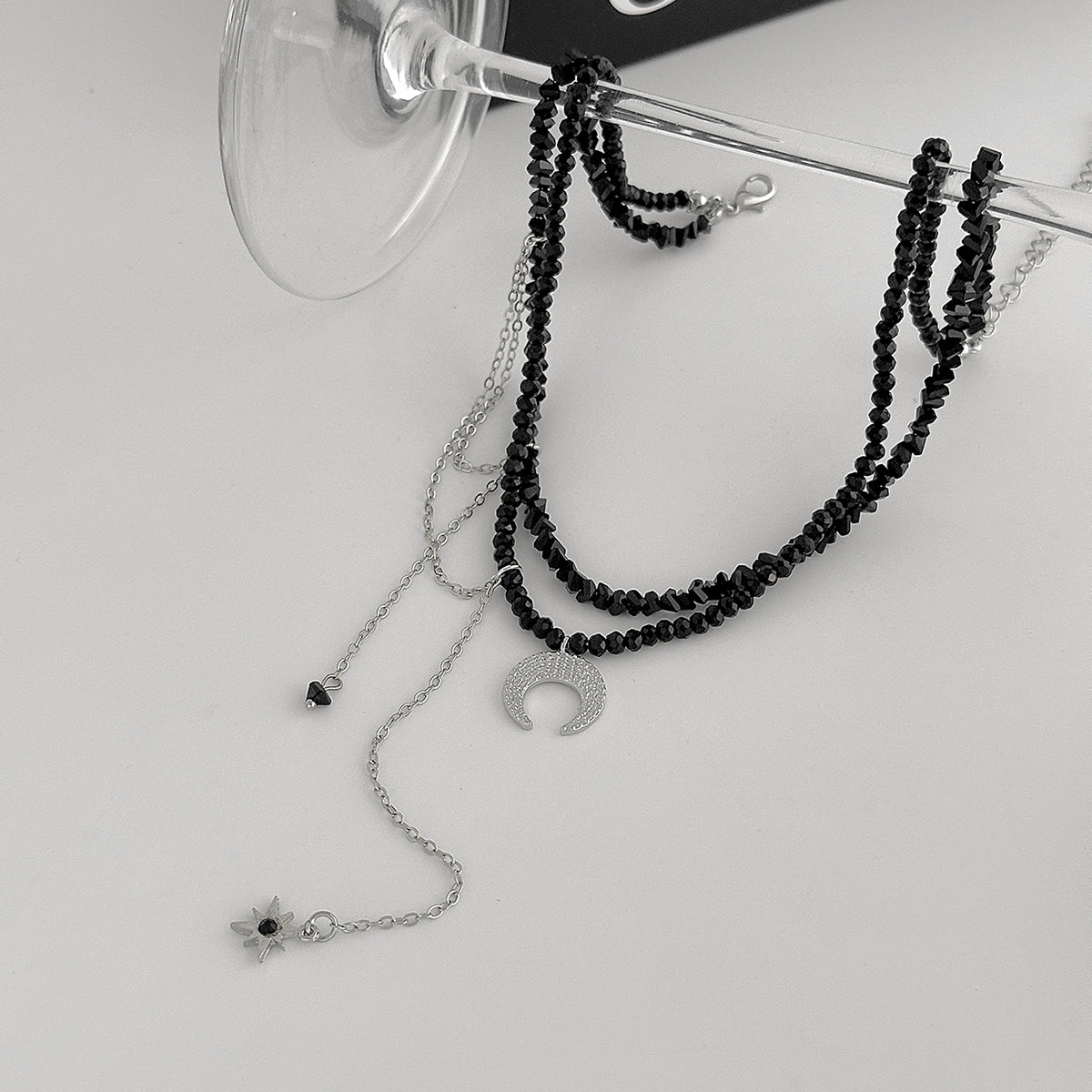 Black Acrylic and Silvertone Hammered Moon Pendant Tassel Necklace, elegant gift for her, detail close-up