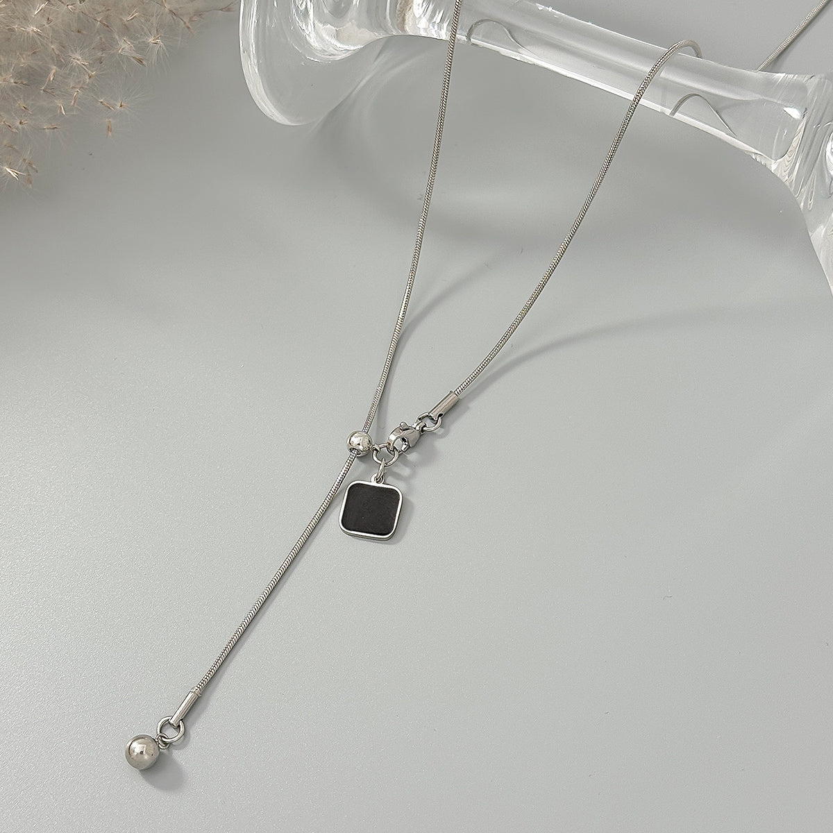 Black Enamel and Silvertone Square Lariat Necklace, everyday style, side view