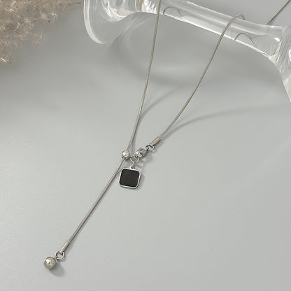 Black Enamel and Silvertone Square Lariat Necklace, everyday style, side view