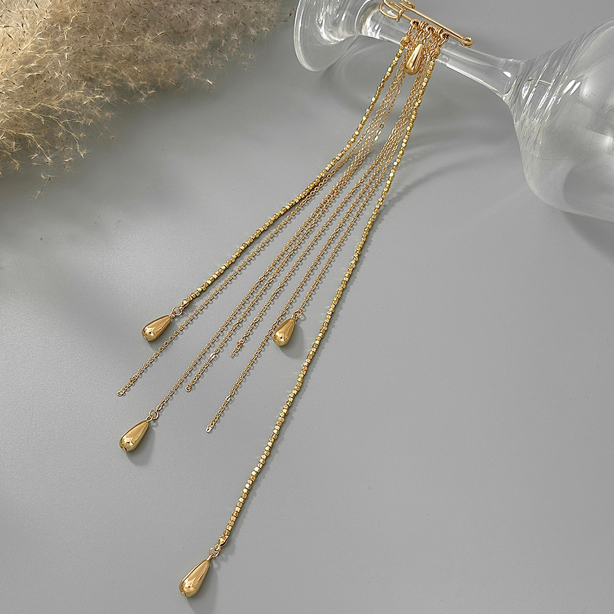 Goldtone Drop Tassel Pin Brooch, everyday style, side view