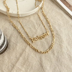 Dazzling 18K gold-plated layered bar necklace, personalized with the name 'Baby Girl' in exquisite gold finish.