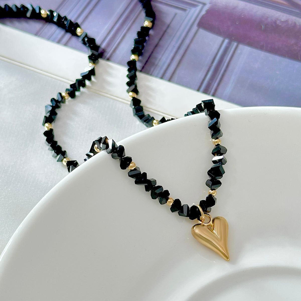 Black Acrylic and Goldtone Heart Pendant Necklace, everyday style, detail close-up