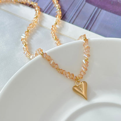 Champagne Acrylic and Goldtone Heart Pendant Necklace, botanical inspired, detail close-up