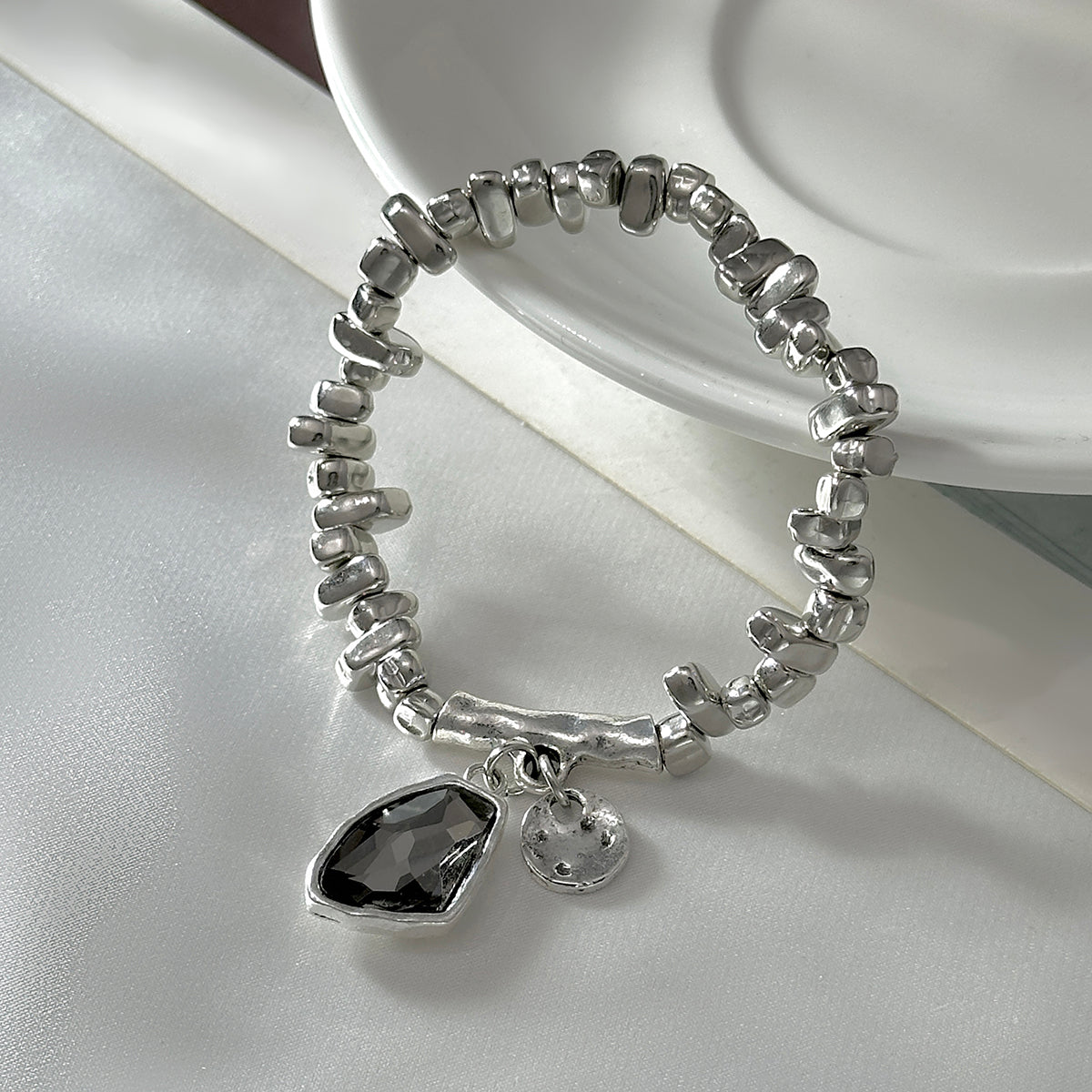 Gray Crystal and Silvertone Irregular Beads Charm Bracelet, silver bracelet for women, botanical inspired, detail close-up
