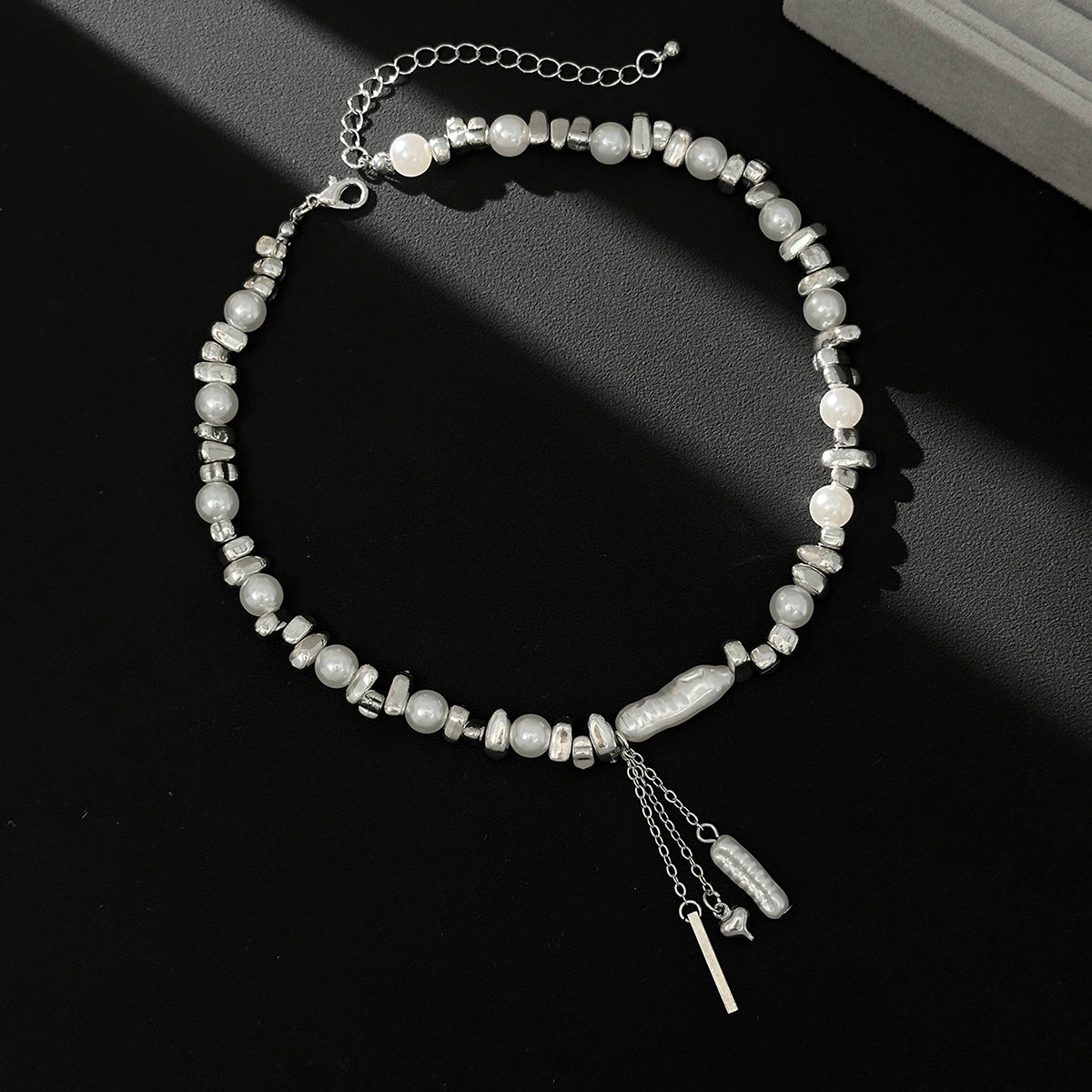 Baroque Pearl and Silvertone Bead Chain Heart Tassel Necklace, dainty minimalist design, side view