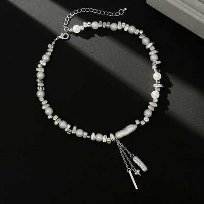 Baroque Pearl and Silvertone Bead Chain Heart Tassel Necklace, dainty minimalist design, side view