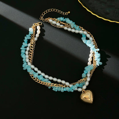 Blue Resin and Pearl Goldtone Heart Pendant Layered Necklace, elegant gift for her, side view