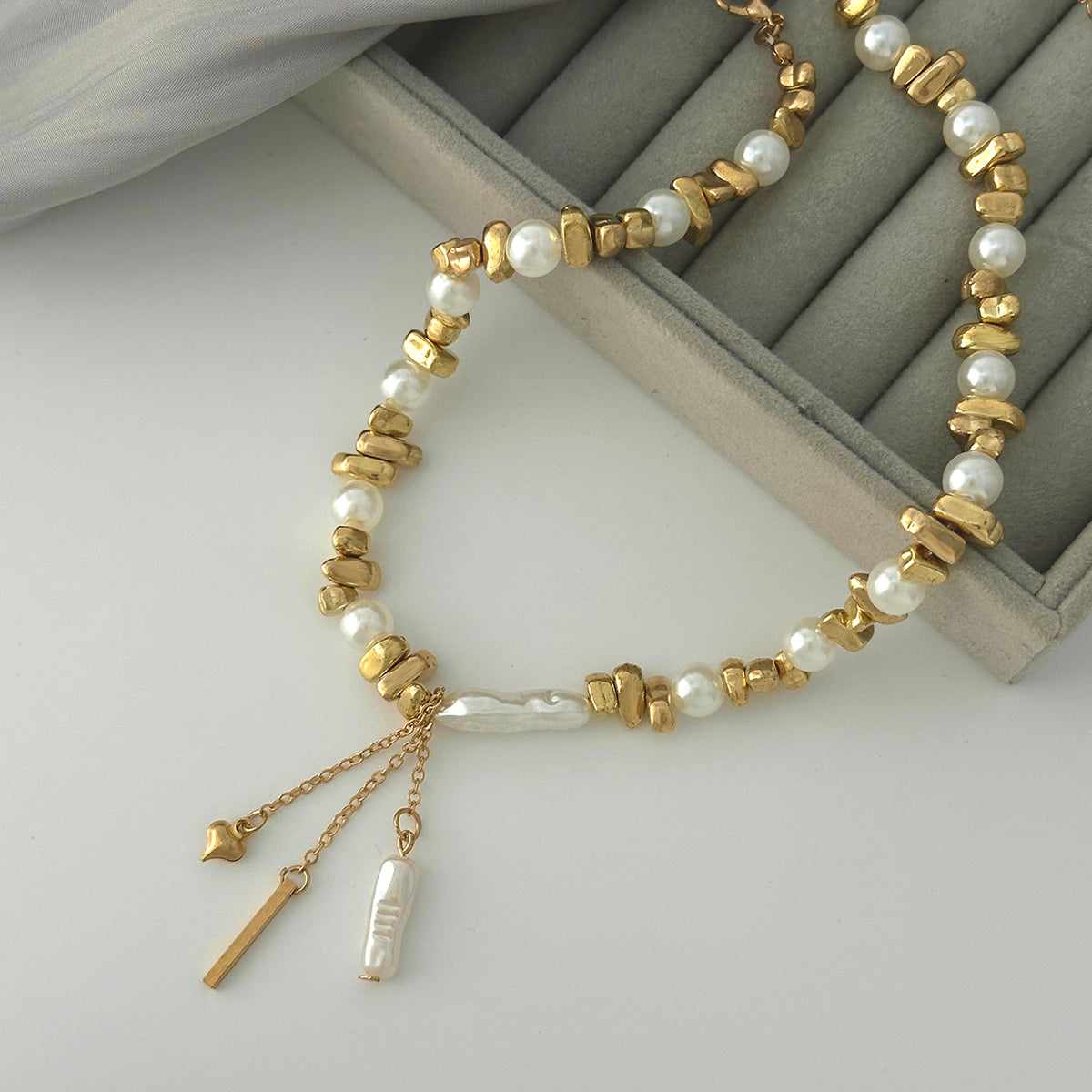 Baroque Pearl and Goldtone Bead Chain Heart Tassel Necklace, vintage-inspired design, detail close-up