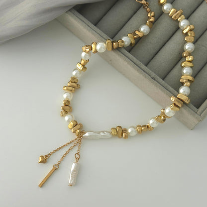 Baroque Pearl and Goldtone Bead Chain Heart Tassel Necklace, vintage-inspired design, detail close-up