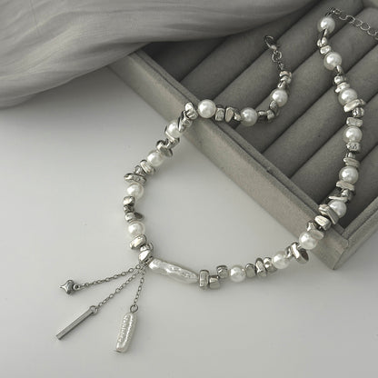 Baroque Pearl and Silvertone Bead Chain Heart Tassel Necklace, dainty minimalist design, detail close-up