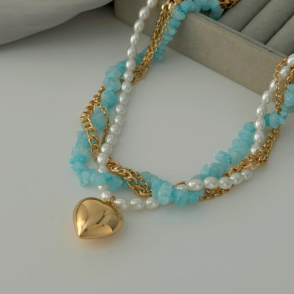 Blue Resin and Pearl Goldtone Heart Pendant Layered Necklace, elegant gift for her, detail close-up