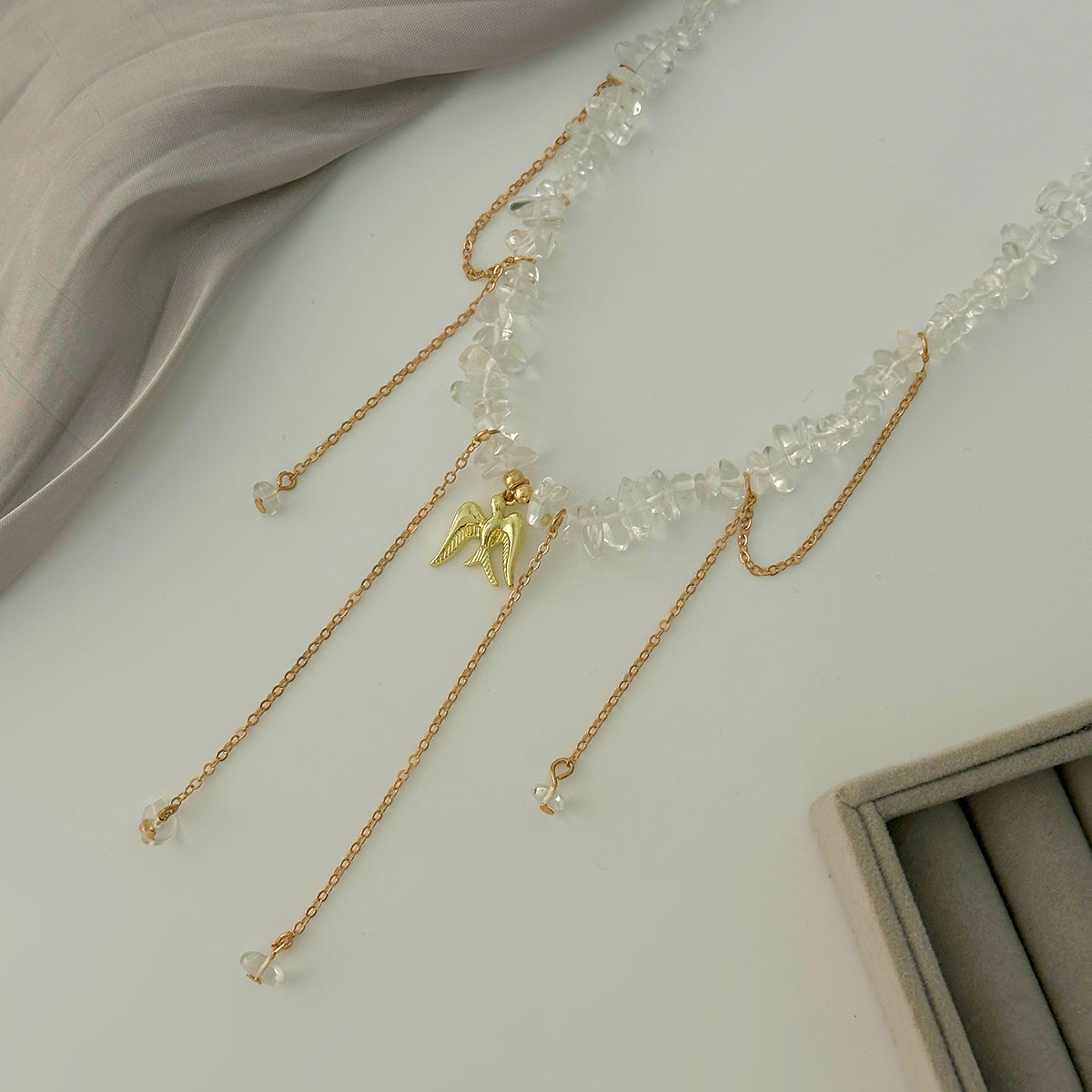 Clear Resin and Goldtone Swallow Pendant Tassel Necklace, everyday style, detail close-up