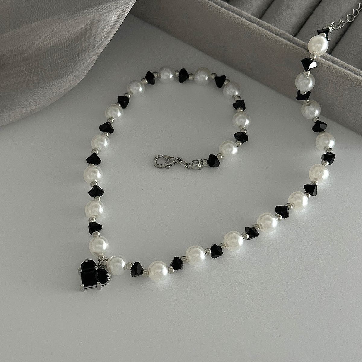 Black Acrylic and Crystal Pearl Silvertone Bead Chain Heart Pendant Necklace, dainty minimalist design, detail close-up