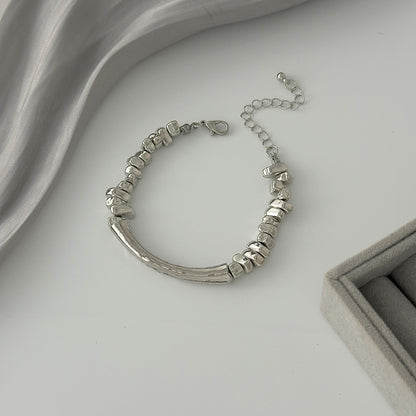Silvertone Curved Bar Irregular Beads Chain Bracelet, silver bracelet for women, everyday style, detail close-up