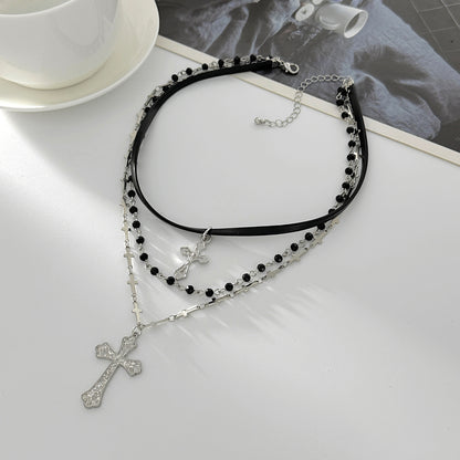 Black Polyurethane and Acrylic Silvertone Cross Pendant Layered Necklace, botanical inspired, side view
