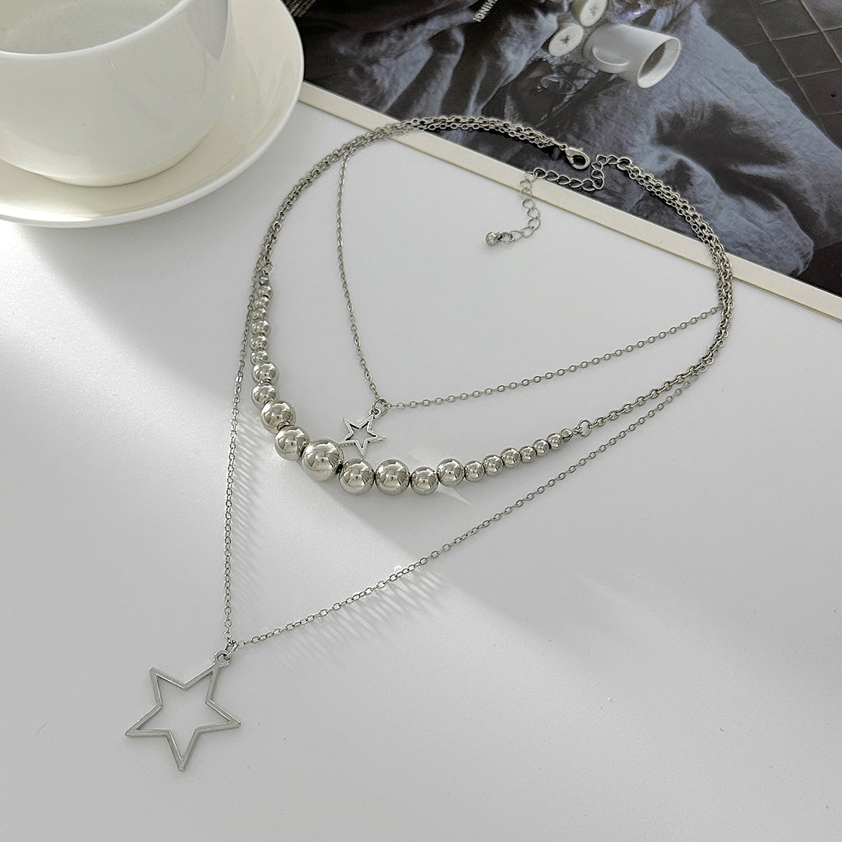Silvertone Graduated Beaded Chain Open Star Pendant Layered Necklace, elegant gift for her, detail close-up