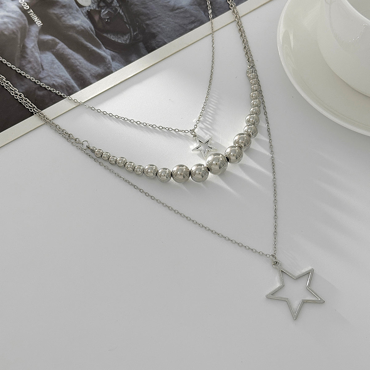 Silvertone Graduated Beaded Chain Open Star Pendant Layered Necklace, elegant gift for her, side view