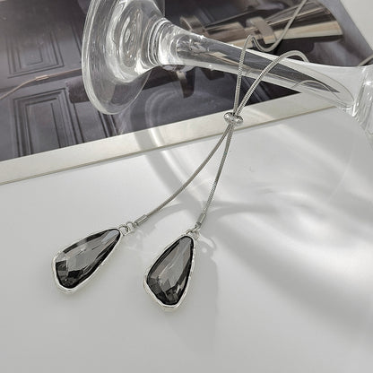 Crystal and Silvertone ‌Triangle Dual-Drop Long Necklace, vintage-inspired design, detail close-up