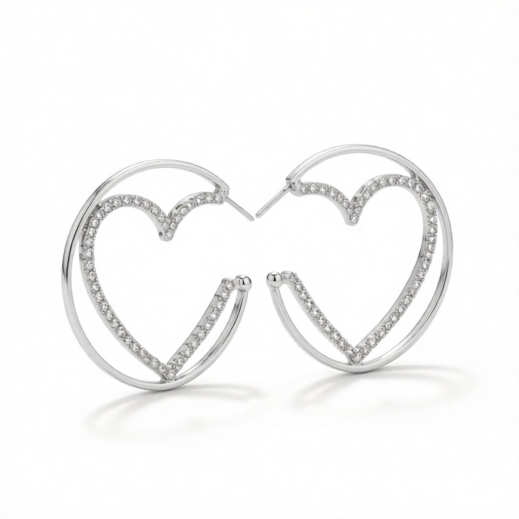 Cubic Zirconia and Silver-Plated Heart Huggie Earrings, silver huggie earrings, dainty minimalist design, side view