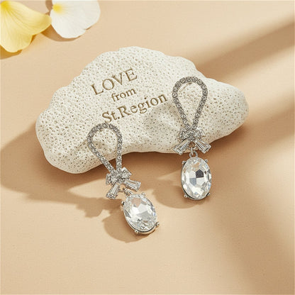 Crystal and Cubic Zirconia Silver-Plated Bow Oval Dangle Earring, silver drop earrings for women, lifestyle look