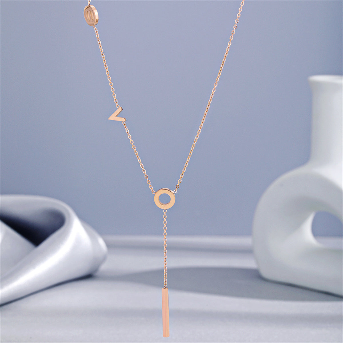 18K Gold-Plated 'Love' Lariat Necklace, gold pendant necklace for women, vintage-inspired design, detail close-up