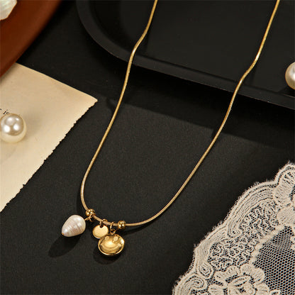 Pearl and 18K Gold-Plated Smiley Pendant Necklace, gold pendant necklace for women, vintage-inspired design, detail close-up