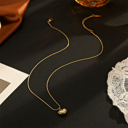 Shell and 18K Gold-Plated Heart Pendant Necklace, gold pendant necklace for women, dainty minimalist design, lifestyle look