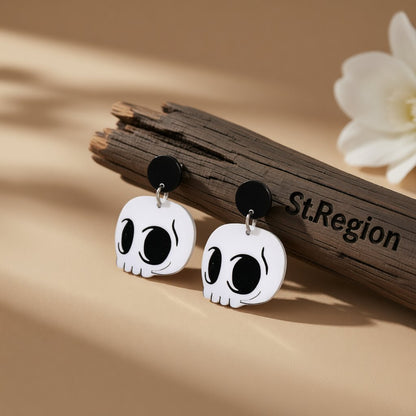 White Acrylic and Silver-Plated Skull Drop Earrings, silver drop earrings for women, vintage-inspired design, front view