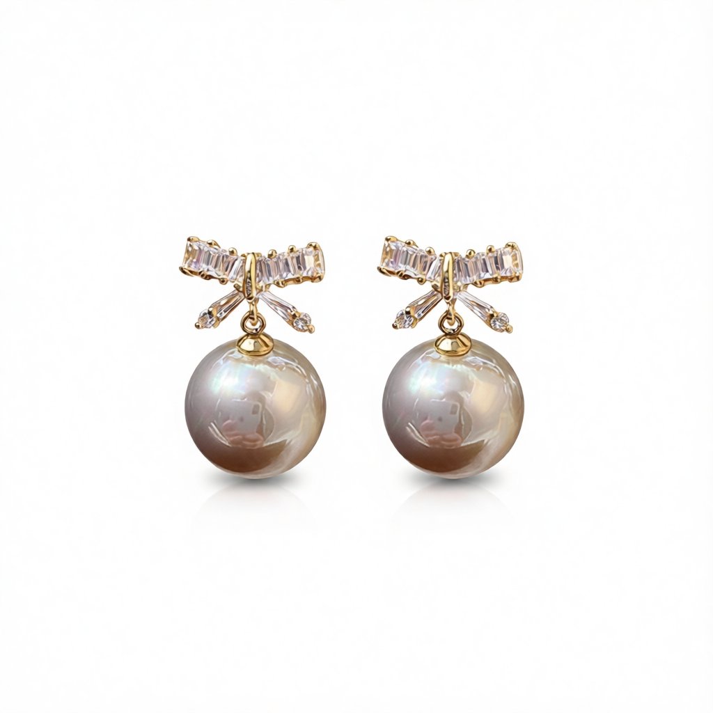 White Crystal and Pearl 18K Gold-Plated Bow Drop Earrings, gold drop earrings for women, dainty minimalist design, side view