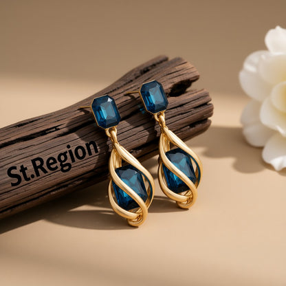 Blue Crystal and 18K Gold-Plated Twisted Drop Earrings, gold drop earrings for women, botanical inspired, front view